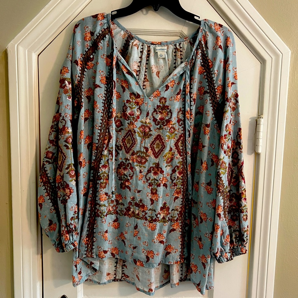 Sundance blouse with embroidery and open weave embellishments. Size L.